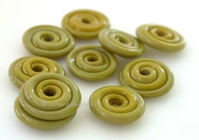 Wasabi Wavy Disk Spacer 10 wavy disks in wasabi green2 sizes available: 11-12 mm with 1.5 mm hole or 13-14 mm with 2.5 mm holeprice is per 10 disks 11-12 mm 1.5 mm hole,12-13 mm 2.5 mm hole