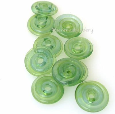 Kiwi Green Wavy Disk Spacer 10 wavy disks in kiwi green2 sizes available: 11-12 mm with 1.5 mm hole or 13-14 mm with 2.5 mm holeprice is per 10 disks 11-12 mm 1.5 mm hole,12-13 mm 2.5 mm hole