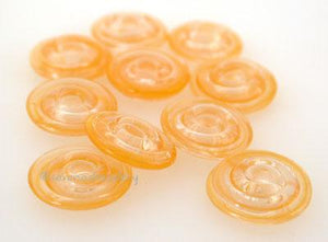 Deep Mimosa Yellow Wavy Disk Spacer 10 wavy disks in deep mimosa yellow2 sizes available: 11-12 mm with 1.5 mm hole or 13-14 mm with 2.5 mm holeprice is per 10 disks 11-12 mm 1.5 mm hole,12-13 mm 2.5 mm hole