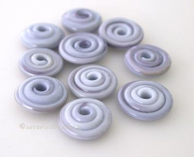 Blueberry Marble Wavy Disk Spacer 10 wavy disks in blueberry marble2 sizes available: 11-12 mm with 1.5 mm hole or 13-14 mm with 2.5 mm holeprice is per 10 disks 11-12 mm 1.5 mm hole,12-13 mm 2.5 mm hole
