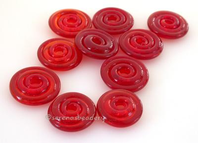 Red Candy Apple Wavy Disk Spacer 10 wavy disks in candy apple red, an odd lot of glass2 sizes available: 11-12 mm with 1.5 mm hole or 13-14 mm with 2.5 mm holeprice is per 10 disks 11-12 mm 1.5 mm hole,12-13 mm 2.5 mm hole