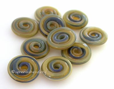 Lichen Dark Wavy Disk Spacer 10 wavy disks in dark lichen, an odd lot of glass2 sizes available: 11-12 mm with 1.5 mm hole or 13-14 mm with 2.5 mm holeprice is per 10 disks 11-12 mm 1.5 mm hole,12-13 mm 2.5 mm hole