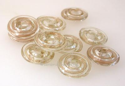 Gold Adventurine Ribbon Wavy Disk Spacer 10 wavy disks in goldstone ribbon2 sizes available: 11-12 mm with 1.5 mm hole or 13-14 mm with 2.5 mm holeprice is per 10 disks 11-12 mm 1.5 mm hole,12-13 mm 2.5 mm hole
