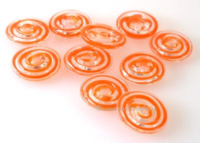 Orange Ribbon Wavy Disk Spacer 10 wavy disks in orange ribbon2 sizes available: 11-12 mm with 1.5 mm hole or 13-14 mm with 2.5 mm holeprice is per 10 disks 11-12 mm 1.5 mm hole,12-13 mm 2.5 mm hole