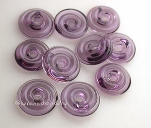 Grape Wavy Disk Spacer 10 wavy disks in grape2 sizes available: 11-12 mm with 1.5 mm hole or 13-14 mm with 2.5 mm holeprice is per 10 disks 11-12 mm 1.5 mm hole,12-13 mm 2.5 mm hole