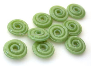 Olive Green Wavy Disk Spacer 10 wavy disks in olive green2 sizes available: 11-12 mm with 1.5 mm hole or 13-14 mm with 2.5 mm holeprice is per 10 disks 11-12 mm 1.5 mm hole,12-13 mm 2.5 mm hole