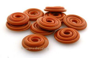 Burnt Orange Wavy Disk Spacer 10 wavy disks in burnt orange2 sizes available: 11-12 mm with 1.5 mm hole or 13-14 mm with 2.5 mm holeprice is per 10 disks 11-12 mm 1.5 mm hole,12-13 mm 2.5 mm hole