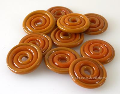 Butterscotch Wavy Disk Spacer 10 wavy disks in butterscotch2 sizes available: 11-12 mm with 1.5 mm hole or 13-14 mm with 2.5 mm holeprice is per 10 disks 11-12 mm 1.5 mm hole,12-13 mm 2.5 mm hole
