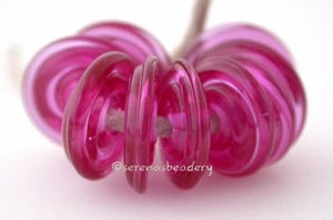 Light Fucshia Pink Wavy Disk Spacer 10 wavy disks in fucshia pink 2 sizes available: 11-12 mm with 1.5 mm hole or 13-14 mm with 2.5 mm holeprice is per 10 disks 11-12 mm 1.5 mm hole,12-13 mm 2.5 mm hole