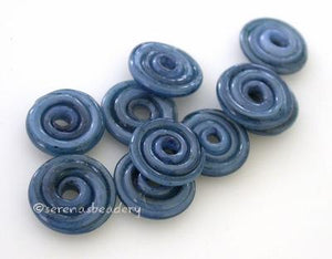 Galaxy Blue Wavy Disk Spacer 10 wavy disks in galaxy blue2 sizes available: 11-12 mm with 1.5 mm hole or 13-14 mm with 2.5 mm holeprice is per 10 disks 11-12 mm 1.5 mm hole,12-13 mm 2.5 mm hole