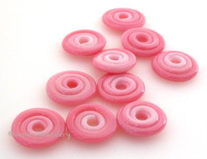 Peachy Keen Wavy Disk Spacer 10 wavy disks in peachy keen2 sizes available: 11-12 mm with 1.5 mm hole or 13-14 mm with 2.5 mm holeprice is per 10 disks 11-12 mm 1.5 mm hole,12-13 mm 2.5 mm hole
