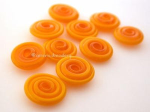 Pumpkin Wavy Disk Spacer 10 wavy disks in pumpkin orange2 sizes available: 11-12 mm with 1.5 mm hole or 13-14 mm with 2.5 mm holeprice is per 10 disks 11-12 mm 1.5 mm hole,12-13 mm 2.5 mm hole
