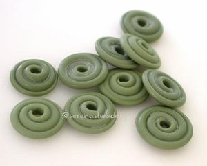 Commando Matte Wavy Disk Spacer 10 wavy disks in commando matte2 sizes available: 11-12 mm with 1.5 mm hole or 13-14 mm with 2.5 mm holeprice is per 10 disks 11-12 mm 1.5 mm hole,12-13 mm 2.5 mm hole