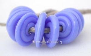 Grumpy Bead Wavy Disk Spacer 10 wavy disks in grumpy bear blue2 sizes available: 11-12 mm with 1.5 mm hole or 13-14 mm with 2.5 mm holeprice is per 10 disks 11-12 mm 1.5 mm hole,12-13 mm 2.5 mm hole