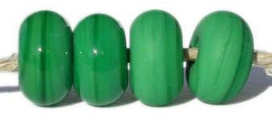 Light Grass green Color Notes: dark green - streaky 5x10 mm Available shapes and sizes:Round Bead Shapes: Available to order 8 to 15 mm with hole sizes ranging from 1.5 to 5 mm. See drop down menu for the exact options. Shown here in 8, 9 and 10 mm with both a 2.5 mm and 1.5 mm hole. 4 and 5 mm holes will fit European Charm style jewelry.Also available in a wavy disk or bead cap:. Pressed bead shapes:Lentil - 12x13 mm in size with a 1.5mm hole.: Pillow 13 mm square with a 1.5 mm hole.: Tab: Default Title