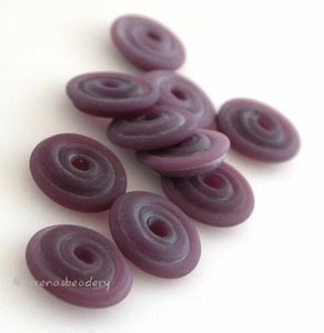 Eggplant Matte Wavy Disk Spacer 10 wavy disks in eggplant in a matte finish2 sizes available: 11-12 mm with 1.5 mm hole or 13-14 mm with 2.5 mm holeprice is per 10 disks 11-12 mm 1.5 mm hole,12-13 mm 2.5 mm hole