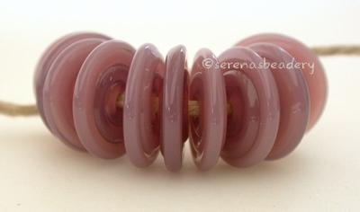 Pastel Plum Wavy Disk Spacer 10 wavy disks in pastel plum2 sizes available: 11-12 mm with 1.5 mm hole or 13-14 mm with 2.5 mm holeprice is per 10 disks 11-12 mm 1.5 mm hole,12-13 mm 2.5 mm hole
