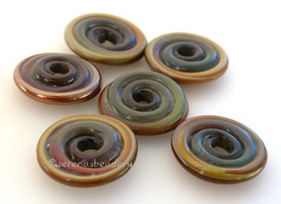 Raku Wavy Disk Spacer 6 wavy disks in raku2 sizes available: 11-12 mm with 1.5 mm hole or 13-14 mm with 2.5 mm holeprice is per 10 disks 11-12 mm 1.5 mm hole,12-13 mm 2.5 mm hole