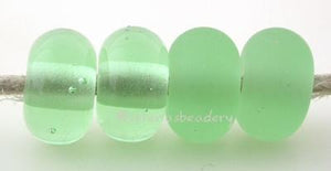 Appletini Color Notes: Available shapes and sizes:Round Bead Shapes: Available to order 8 to 15 mm with hole sizes ranging from 1.5 to 5 mm. See drop down menu for the exact options. Shown here in 8, 9 and 10 mm with both a 2.5 mm and 1.5 mm hole. 4 and 5 mm holes will fit European Charm style jewelry.Also available in a wavy disk or bead cap:. Pressed bead shapes:Lentil - 12x13 mm in size with a 1.5mm hole.: Pillow 13 mm square with a 1.5 mm hole.: Tab: Default Title