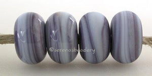 Blueberry Marble Color Notes: streak purple 5x10 mm Available shapes and sizes:Round Bead Shapes: Available to order 8 to 15 mm with hole sizes ranging from 1.5 to 5 mm. See drop down menu for the exact options. Shown here in 8, 9 and 10 mm with both a 2.5 mm and 1.5 mm hole. 4 and 5 mm holes will fit European Charm style jewelry.Also available in a wavy disk or bead cap:. Pressed bead shapes:Lentil - 12x13 mm in size with a 1.5mm hole.: Pillow 13 mm square with a 1.5 mm hole.: Tab: Default Title