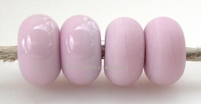 Bubble Gum Pink Color Notes: dark pink - just as good as dark pink, maybe with a hint more blue 5x10 mm Available shapes and sizes:Round Bead Shapes: Available to order 8 to 15 mm with hole sizes ranging from 1.5 to 5 mm. See drop down menu for the exact options. Shown here in 8, 9 and 10 mm with both a 2.5 mm and 1.5 mm hole. 4 and 5 mm holes will fit European Charm style jewelry.Also available in a wavy disk or bead cap:. Pressed bead shapes:Lentil - 12x13 mm in size with a 1.5mm hole.: Pillow 13 mm squar