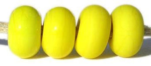 Bright Acid Yellow Color Notes: Nice strong, bright opaque yellow 5x10 mm Available shapes and sizes:Round Bead Shapes: Available to order 8 to 15 mm with hole sizes ranging from 1.5 to 5 mm. See drop down menu for the exact options. Shown here in 8, 9 and 10 mm with both a 2.5 mm and 1.5 mm hole. 4 and 5 mm holes will fit European Charm style jewelry.Also available in a wavy disk or bead cap:. Pressed bead shapes:Lentil - 12x13 mm in size with a 1.5mm hole.: Pillow 13 mm square with a 1.5 mm hole.: Tab: De