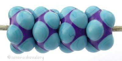 Cobalt Turquoise Bumps beads with a cobalt base and turquoise bumps 7x13 mm price is per bead Glossy,Matte