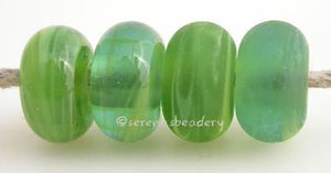 Kiwi Color Notes: swirly green 5x10 mm Available shapes and sizes:Round Bead Shapes: Available to order 8 to 15 mm with hole sizes ranging from 1.5 to 5 mm. See drop down menu for the exact options. Shown here in 8, 9 and 10 mm with both a 2.5 mm and 1.5 mm hole. 4 and 5 mm holes will fit European Charm style jewelry.Also available in a wavy disk or bead cap:. Pressed bead shapes:Lentil - 12x13 mm in size with a 1.5mm hole.: Pillow 13 mm square with a 1.5 mm hole.: Tab: Default Title