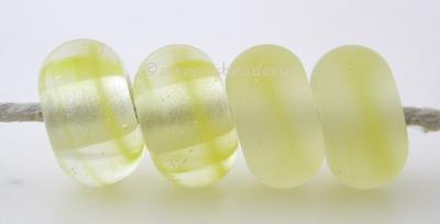 Mimosa Yellow Color Notes: streaky yellow and clear 5x10 mm Available shapes and sizes:Round Bead Shapes: Available to order 8 to 15 mm with hole sizes ranging from 1.5 to 5 mm. See drop down menu for the exact options. Shown here in 8, 9 and 10 mm with both a 2.5 mm and 1.5 mm hole. 4 and 5 mm holes will fit European Charm style jewelry.Also available in a wavy disk or bead cap:. Pressed bead shapes:Lentil - 12x13 mm in size with a 1.5mm hole.: Pillow 13 mm square with a 1.5 mm hole.: Tab: Default Title
