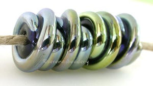 Black Lustre Raised Spirals black beads with a raised lustre spiral6x12 mmprice is per bead Default Title