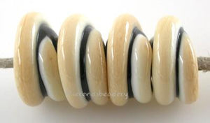 Black Ivory Raised Spirals black beads with a raised ivory spiral6x12 mmprice is per bead Glossy,Matte