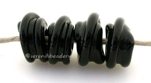 Black Raised Spirals black beads with a raised black spiral6x12 mmprice is per bead Glossy,Matte