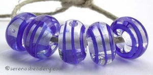 Dark Blue Spiral Stripe a dark blue ribbon spiral stripe with a clear heart6x12 mmprice is per bead Default Title