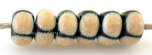 Black and Ivory Circle Dots black and ivory circle dots 5x11 mm price is per bead Glossy,Matte