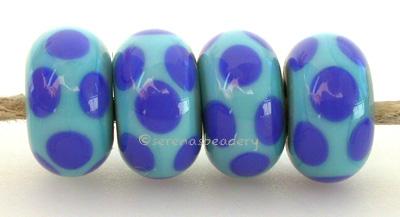 Turquoise Cobalt Dice Dots A turquoise base with cobalt dice dots. 5x11 mm price is per bead Glossy,No,Glossy,Yes,Matte,No,Matte,Yes