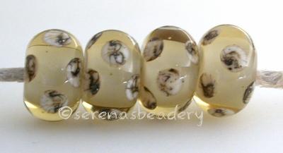 Straw Yellow White Heart Silvered Ivory Dice Straw yellow white heart with silvered ivory dice dots. 5x12 mm price is per bead Glossy,Matte