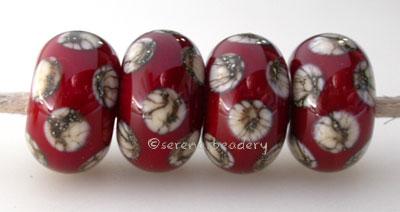 Opaque Red Silvered Ivory Dice An opaque red base with silvered ivory dice dots. 5x11 mm price is per bead Glossy,Matte