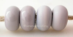 Misty Blue Color Notes: soft blue with lavender highlights 5x10 mm Available shapes and sizes:Round Bead Shapes: Available to order 8 to 15 mm with hole sizes ranging from 1.5 to 5 mm. See drop down menu for the exact options. Shown here in 8, 9 and 10 mm with both a 2.5 mm and 1.5 mm hole. 4 and 5 mm holes will fit European Charm style jewelry.Also available in a wavy disk or bead cap:. Pressed bead shapes:Lentil - 12x13 mm in size with a 1.5mm hole.: Pillow 13 mm square with a 1.5 mm hole.: Tab: Default T
