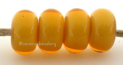 Honey Amber White Heart light amber with a white heart6x12 mmprice is per bead Glossy,Matte