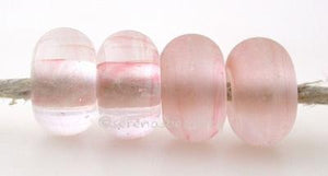 Whisper Color Notes: pale pink 5x10 mm Available shapes and sizes:Round Bead Shapes: Available to order 8 to 15 mm with hole sizes ranging from 1.5 to 5 mm. See drop down menu for the exact options. Shown here in 8, 9 and 10 mm with both a 2.5 mm and 1.5 mm hole. 4 and 5 mm holes will fit European Charm style jewelry.Also available in a wavy disk or bead cap:. Pressed bead shapes:Lentil - 12x13 mm in size with a 1.5mm hole.: Pillow 13 mm square with a 1.5 mm hole.: Tab: Default Title