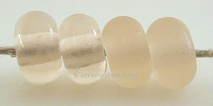 Apricot Tint Color Notes: an oddlot color that is no longer in production - once its gone, there will be no more 5x10 mm Available shapes and sizes:Round Bead Shapes: Available to order 8 to 15 mm with hole sizes ranging from 1.5 to 5 mm. See drop down menu for the exact options. Shown here in 8, 9 and 10 mm with both a 2.5 mm and 1.5 mm hole. 4 and 5 mm holes will fit European Charm style jewelry.Also available in a wavy disk or bead cap:. Pressed bead shapes:Lentil - 12x13 mm in size with a 1.5mm hole.: P