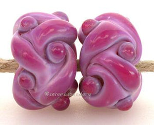 Purple Woven a pair of evil purple woven beadsthe woven beads are a very intricate and unique design with lots of texture 7x13 mm Glossy,Matte