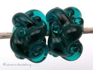 Dark Teal Woven a pair of dark teal woven beadsthe woven beads are a very intricate and unique design with lots of texture 7x13 mm Glossy,Matte