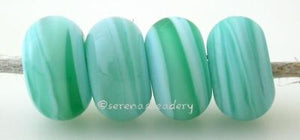 Caribbean Sea Color Notes: streaky aqua and sky blue 5x10 mm Available shapes and sizes:Round Bead Shapes: Available to order 8 to 15 mm with hole sizes ranging from 1.5 to 5 mm. See drop down menu for the exact options. Shown here in 8, 9 and 10 mm with both a 2.5 mm and 1.5 mm hole. 4 and 5 mm holes will fit European Charm style jewelry.Also available in a wavy disk or bead cap:. Pressed bead shapes:Lentil - 12x13 mm in size with a 1.5mm hole.: Pillow 13 mm square with a 1.5 mm hole.: Tab: Default Title