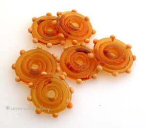 Amber Wavy Disks with Squash Yellow Dots Amber disks with squash yellow dots3x17-18 mm price is per 6 disks Default Title