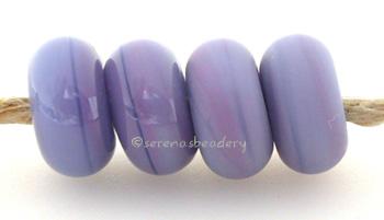 Gonzo Grape Color Notes: an oddlot color that is no longer in production - once its gone, there will be no more 5x10 mm Available shapes and sizes:Round Bead Shapes: Available to order 8 to 15 mm with hole sizes ranging from 1.5 to 5 mm. See drop down menu for the exact options. Shown here in 8, 9 and 10 mm with both a 2.5 mm and 1.5 mm hole. 4 and 5 mm holes will fit European Charm style jewelry.Also available in a wavy disk or bead cap:. Pressed bead shapes:Lentil - 12x13 mm in size with a 1.5mm hole.: Pi