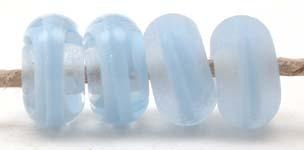 Periwinkle Ribbon Color Notes: periwinkle ribbon cased in clear 5x10 mm Available shapes and sizes:Round Bead Shapes: Available to order 8 to 15 mm with hole sizes ranging from 1.5 to 5 mm. See drop down menu for the exact options. Shown here in 8, 9 and 10 mm with both a 2.5 mm and 1.5 mm hole. 4 and 5 mm holes will fit European Charm style jewelry.Also available in a wavy disk or bead cap:. Pressed bead shapes:Lentil - 12x13 mm in size with a 1.5mm hole.: Pillow 13 mm square with a 1.5 mm hole.: Tab: Defa