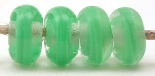 Nile Green Ribbon Color Notes: nile green ribbon cased in clear 5x10 mm Available shapes and sizes:Round Bead Shapes: Available to order 8 to 15 mm with hole sizes ranging from 1.5 to 5 mm. See drop down menu for the exact options. Shown here in 8, 9 and 10 mm with both a 2.5 mm and 1.5 mm hole. 4 and 5 mm holes will fit European Charm style jewelry.Also available in a wavy disk or bead cap:. Pressed bead shapes:Lentil - 12x13 mm in size with a 1.5mm hole.: Pillow 13 mm square with a 1.5 mm hole.: Tab: Defa