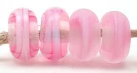 Pink Ribbon Color Notes: pink ribbon cased in clear 5x10 mm Available shapes and sizes:Round Bead Shapes: Available to order 8 to 15 mm with hole sizes ranging from 1.5 to 5 mm. See drop down menu for the exact options. Shown here in 8, 9 and 10 mm with both a 2.5 mm and 1.5 mm hole. 4 and 5 mm holes will fit European Charm style jewelry.Also available in a wavy disk or bead cap:. Pressed bead shapes:Lentil - 12x13 mm in size with a 1.5mm hole.: Pillow 13 mm square with a 1.5 mm hole.: Tab: Default Title