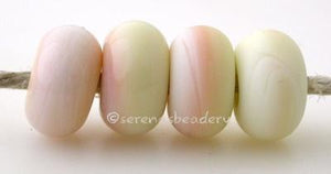 Pale Opal Yellow Color Notes: pale version of opal yellow, less streaky 5x10 mm Available shapes and sizes:Round Bead Shapes: Available to order 8 to 15 mm with hole sizes ranging from 1.5 to 5 mm. See drop down menu for the exact options. Shown here in 8, 9 and 10 mm with both a 2.5 mm and 1.5 mm hole. 4 and 5 mm holes will fit European Charm style jewelry.Also available in a wavy disk or bead cap:. Pressed bead shapes:Lentil - 12x13 mm in size with a 1.5mm hole.: Pillow 13 mm square with a 1.5 mm hole.: T